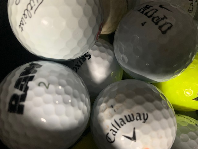 Random Golf balls in a bucket