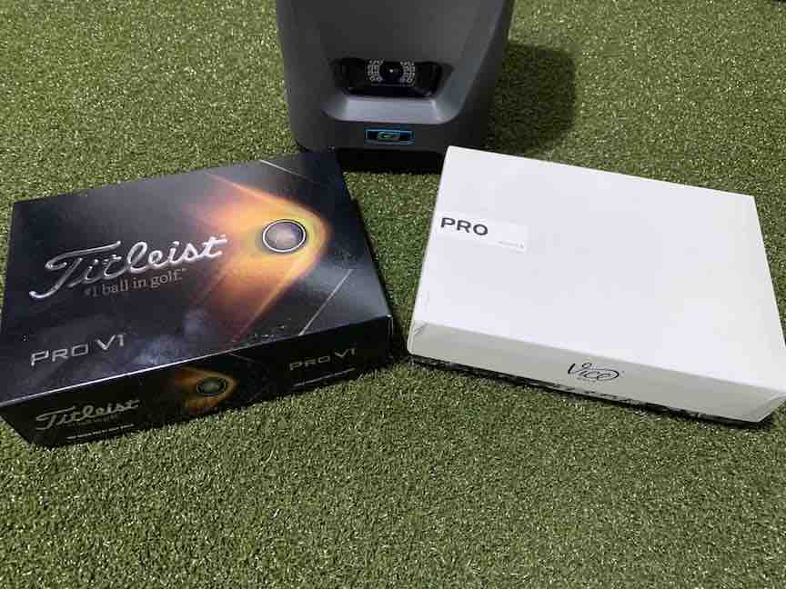 Vice Pro and Pro V1 with GC3 launch monitor and turf background.