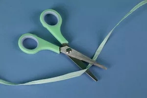 scissors cutting ribbon