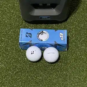 Bridgestone e9 Long Drive Golf balls in front of the GC3 launch monitor