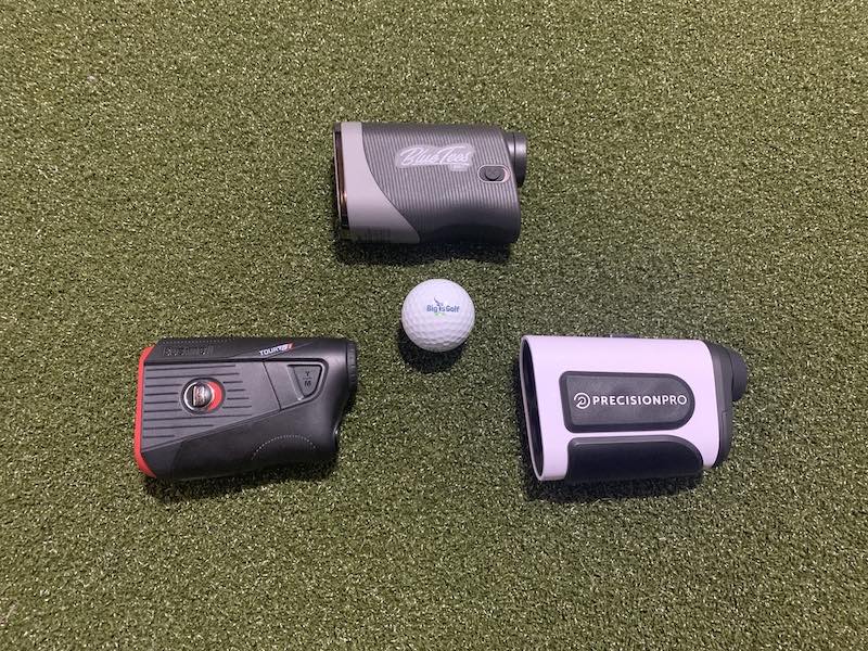 Bushnell Tour V5 Shift, Precision Pro NX10, and Blue Tees Series 3 Max rangefinders with a Big Tees Golf logo ball in the middle.