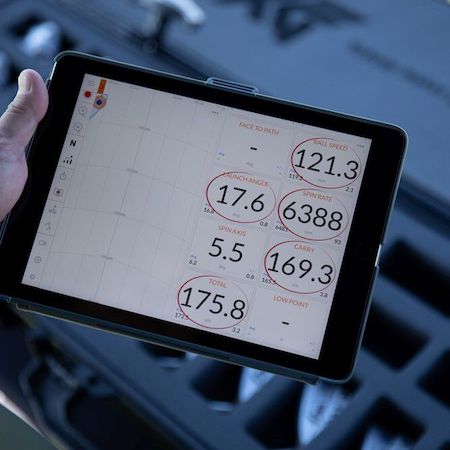 Club and ball data during a golf club fitting, data from trackman displayed on an ipad