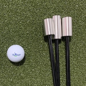 Superspeed sticks next to a bigteesgolf logo ball