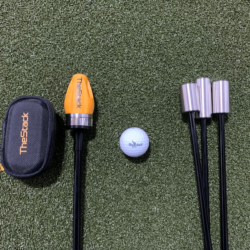 The stack system vs superspeed side-by-side with a golf ball in the middle.