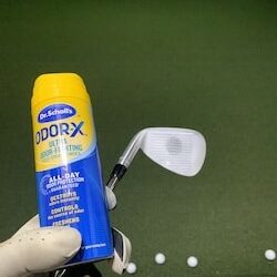 Foot powder spray and a golf club showing ball impact location on the club face.