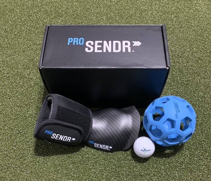Prosendr review cover photo with compression sphere sitting in front of the product box and a bigteesgolf logo ball.