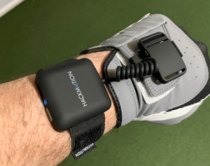 HackMotion Sensor being worn with a golf glove.