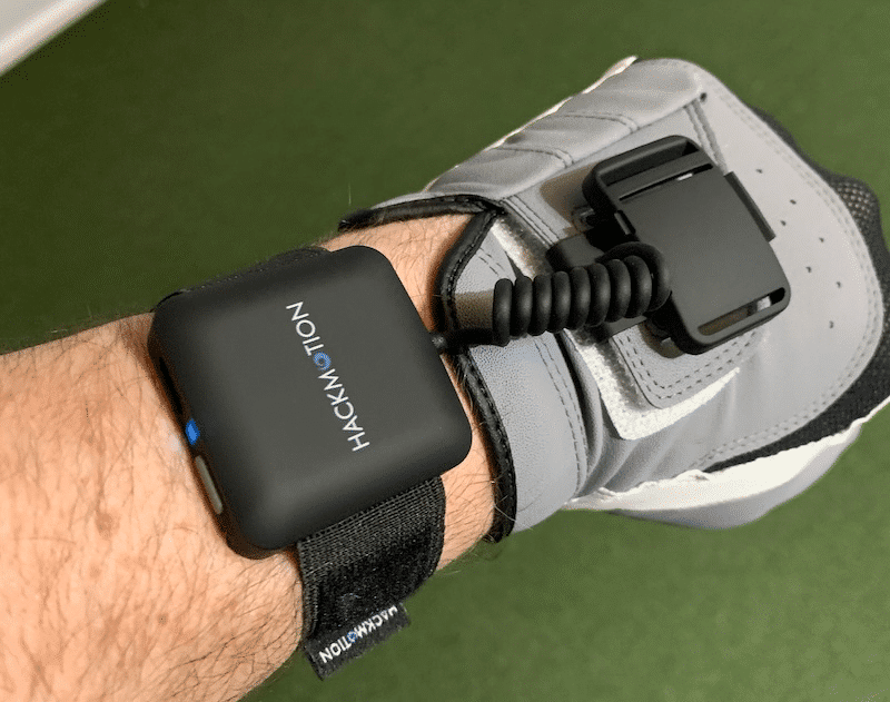 HackMotion Sensor being worn with a golf glove.